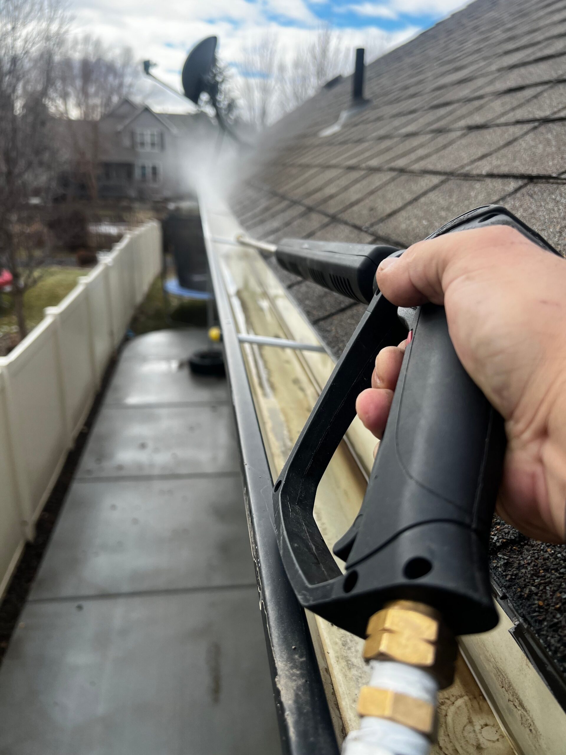 Residential gutter cleaning and preventative exterior maintenance