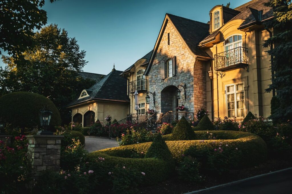 Large upscale home with landscaped front garden